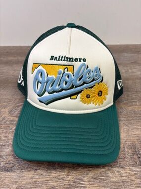 New Era Baltimore Orioles State Flower 9FORTY Trucker Hat Green Cream Adjustable